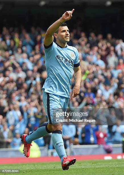 Sergio Aguero of Manchester City celebrates after scoring his team's third goal during the Barclays Premier League match between Manchester City and...