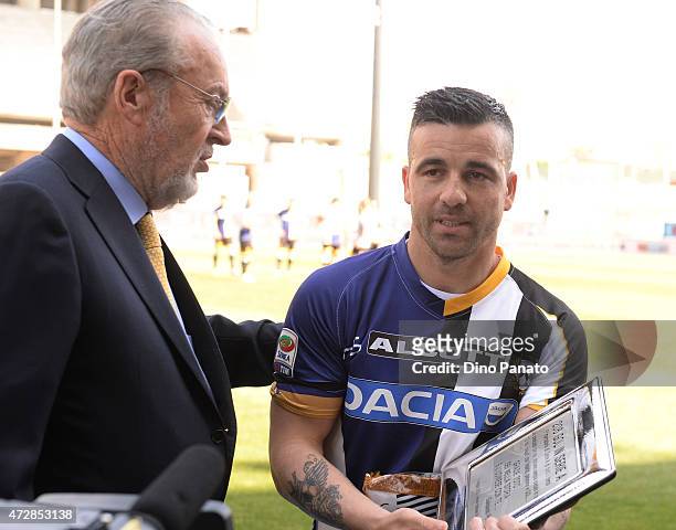 Antonio Di Natale of Udinese Calcio receives placque to Gianpaolo Pozzo for his 206 Goal in serie A before the Serie A match between Udinese Calcio...