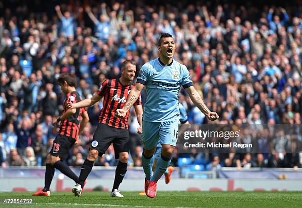 Sergio Aguero of Manchester City celebrates after scoring his team's fourth goal from the penalty spot during the Barclays Premier League match...