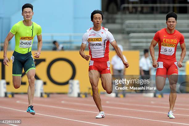 Kei Takase , Peimeng Zhang and Bingtian Su compete in the M100m during the Seiko Golden Grand Prix Tokyo 2015 at Todoroki Stadium on May 10, 2015 in...