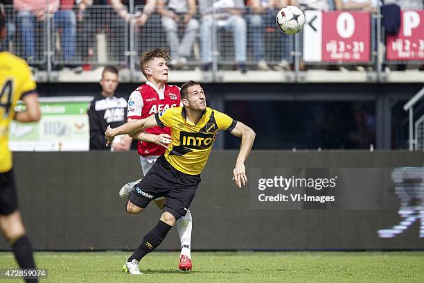 Mattias Johansson of AZ, Remy Amieux of NAC Breda during the Dutch Eredivisie match between AZ Alkmaar and NAC Breda at AFAS stadium on May 10, 2015...