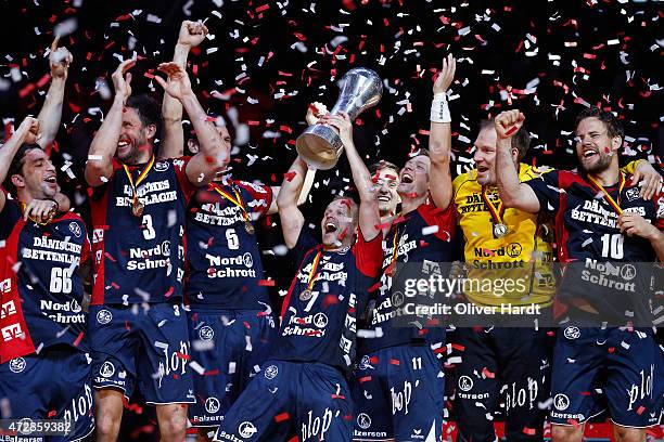 Anders Eggert of Flensburg celebrates with the tropy after the DHB Cup Final match between SG Flensburg-Handewitt and SC Magdeburg at O2 World on May...