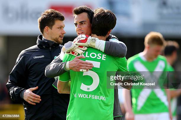 Diego Benaglio of Wolfsburg embraces Timm Klose of Wolfsburg after winning 3-1 the Bundesliga match between SC Paderborn 07 and VfL Wolfsburg at...