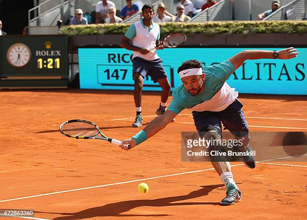 Rohan Bopanna of India and Florin Mergea of Romania in action during their three set victory against Marcin Matkowski of Poland and Nenad Zimonjic of...