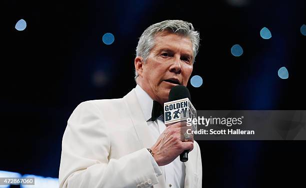 Sports announcer Michael Buffer waits in the ring prior to the super welterweight bout between Canelo Alvarez and James Kirkland at Minute Maid Park...