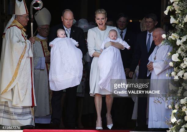 Prince Albert II of Monaco and his wife Princess Charlene leave the cathedral after the baptism of their twins Prince Jacques and Princess Gabriella...