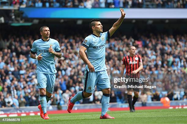 Sergio Aguero of Manchester City celebrates after scoring his team's third goal during the Barclays Premier League match between Manchester City and...