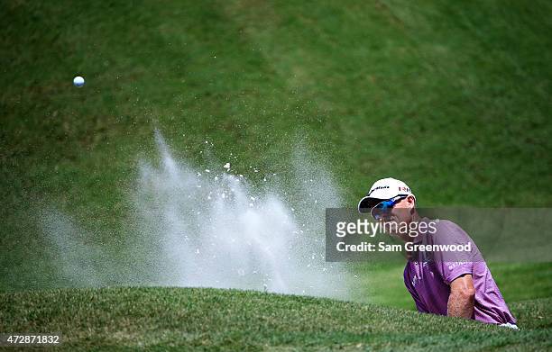 John Senden of Australia plays a shot from a bunker on the second hole during the final round of THE PLAYERS Championship at the TPC Sawgrass Stadium...