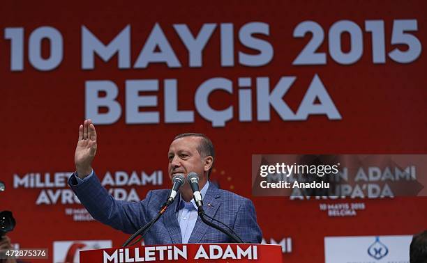 Turkeys President Recep Tayyip Erdogan greets crowd during an event organized by Turkish youth organizations at Ethias Arena in Hasselt, Belgium on...