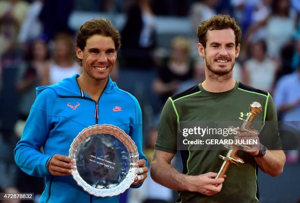 Spanish tennis player Rafael Nadal and Scottish tennis player Andy Murray pose on the podium of the men final of Madrid Open tournament at the Caja...