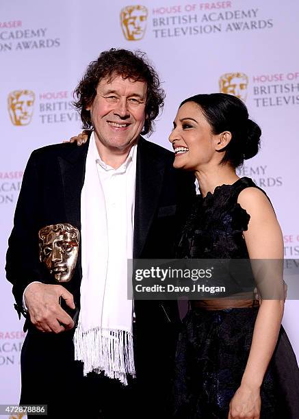 Archie Panjabi and Stephen Rea winner of Best Supporting Actor poses in the winners room at the House of Fraser British Academy Television Awards at...