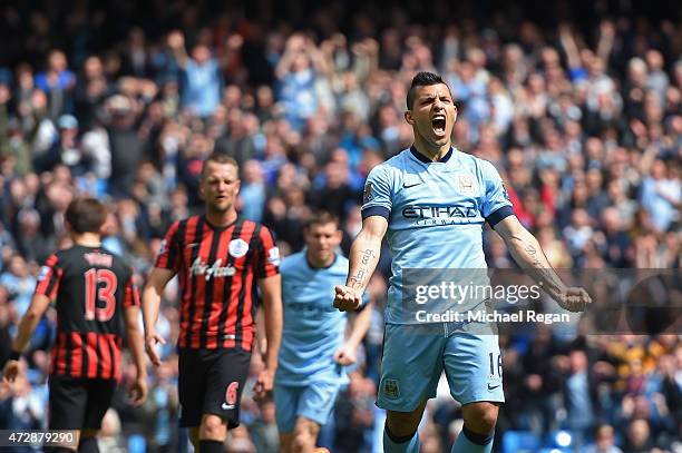 Sergio Aguero of Manchester City celebrates after scoring his team's fourth goal from the penalty spot during the Barclays Premier League match...