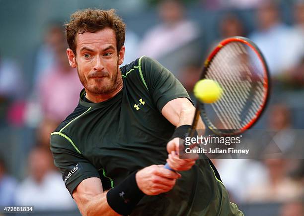 Andy Murray of Great Britain in action against Rafael Nadal of Spain in the final during day nine of the Mutua Madrid Open tennis tournament at the...