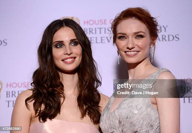 Heida Reed and Eleanor Tomlinson pose in the winners room at the House of Fraser British Academy Television Awards at Theatre Royal on May 10, 2015...