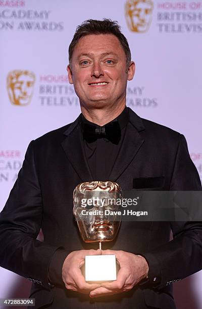 Jeff Pope winner of the Special Award poses in the winners room at the House of Fraser British Academy Television Awards at Theatre Royal on May 10,...