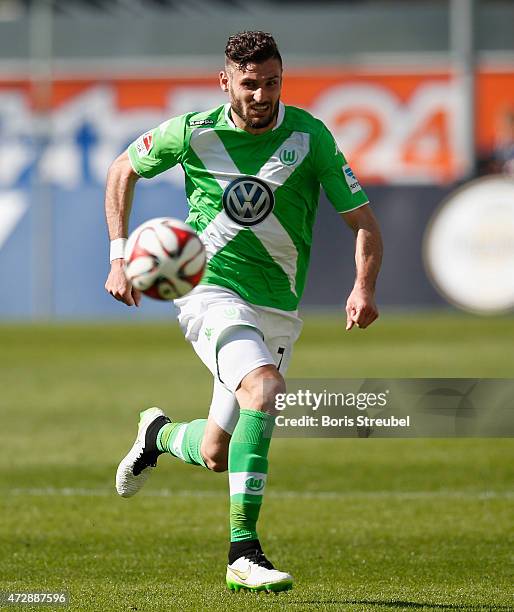 Daniel Caligiuri of Paderborn runs with the ball during the Bundesliga match between SC Paderborn and VfL Wolfsburg at Benteler Arena on May 10, 2015...