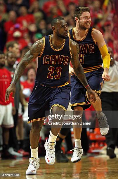 LeBron James and Matthew Dellavedova of the Cleveland Cavaliers celebrate a win over the Chicago Bulls in Game Four of the Eastern Conference...