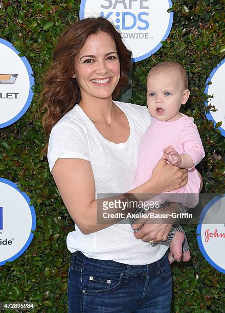 Actress Rebecca Budig and daughter Charlotte Jo Benson attend Safe Kids Day at The Lot on April 26, 2015 in West Hollywood, California.