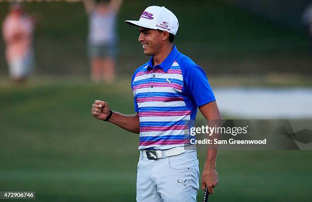 Rickie Fowler celebrates as he wins the playoff in the final round of THE PLAYERS Championship at the TPC Sawgrass Stadium course on May 10, 2015 in...