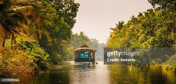 houseboat on the kerala backwaters in south of india - kerala stock pictures, royalty-free photos & images