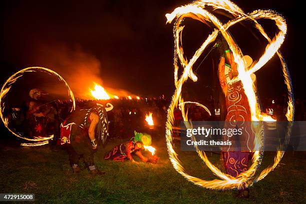 fire dancers at the beltane fire festival, edinburgh - beltane fire festival stock pictures, royalty-free photos & images