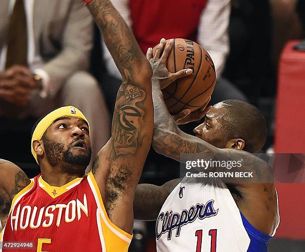Los Angeles Clippers Jamal Crawford shoots around Houston Rockets Josh Smith in Game Four of their NBA playoff series, May 10, 2015 at Staples Center...