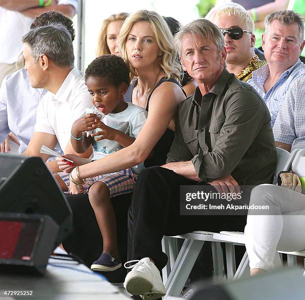 Actress Charlize Theron with her son, Jackson Theron, and actor Sean Penn attend the generationOn west coast block party at Fox Studio Lot on April...