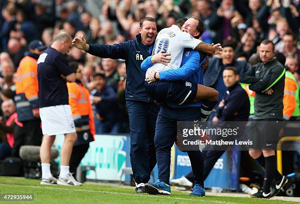 Jermaine Beckford of Preston North End celebrates with manager Simon Grayson after he scores their third goal during the Sky Bet League One Playoff...
