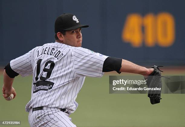 Irwin Delgado of Guerreros de Oaxaca delivers a pitch during a match between Pericos de Puebla and Guerreros de Oaxaca as part of Mexican Baseball...