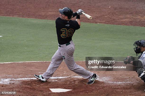 Luke Scott of Pericos de Puebla hits the ball during a match between Pericos de Puebla and Guerreros de Oaxaca as part of Mexican Baseball League...