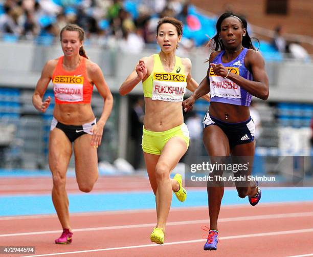 Olga Safronova of Kazakhstan, Chisato Fukushima of Japan, and Tiffany Townsend of USA compete in Women's 200m during the Seiko Golden Grand Prix...