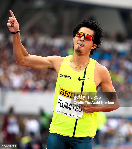 Kenji Fujimitsu of Japan competes in Men's 200m during the Seiko Golden Grand Prix Tokyo 2015 at Todoroki Stadium on May 10, 2015 in Kawasaki,...