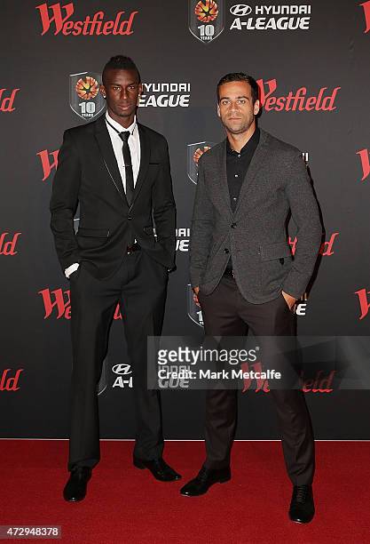 Bernie Ibini and Alex Brosque of Sydney FC arrive ahead of the A-League & W-League 2014/15 Awards Night at Carriageworks on May 11, 2015 in Sydney,...