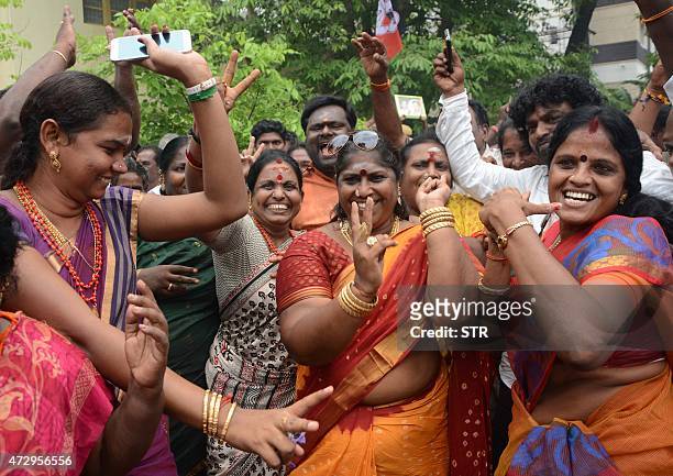 All India Anna Dravida Munnetra Kazhagam party cadres celebrate after party chief Jayalalithaa Jayaram was cleared of corruption charges by Karnataka...