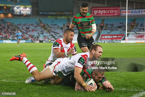 Aaron Gray of the Rabbitohs scores a try during the round nine NRL match between the South Sydney Rabbitohs and the St George Illawarra Dragons at...