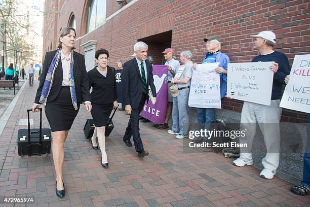 Members of the legal defense team for Boston Marathon bombing suspect Dzhokhar Tsarnaev, including Judy Clarke, Miriam Conrad and David Bruck pass...