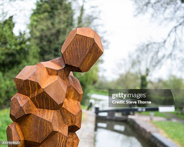 General view of the newly installed sculpture by artist Anthony Gormley at the Canal Workers Cottage on May 11, 2015 in Henley-In-Arden,...
