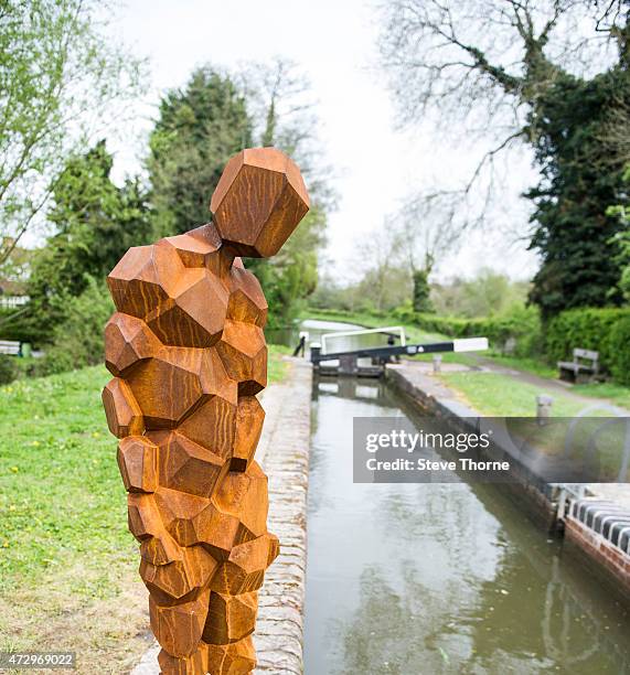 General view of the newly installed sculpture by artist Anthony Gormley at the Canal Workers Cottage on May 11, 2015 in Henley-In-Arden,...