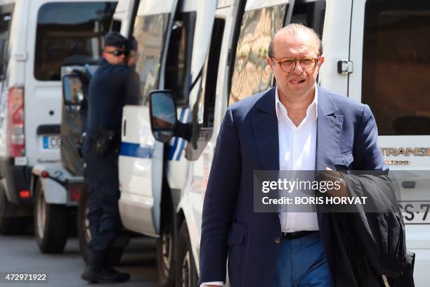 Herve Temime, lawyer of Guy Orsoni, arrives at the courthouse of Aix-en-Provence on May 11, 2015. The trial of eleven people, including Corsican...
