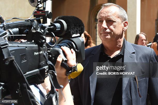 Former president of Ajaccio's football Club Alain Orsoni, father of Guy Orsoni, arrives for his trial at the courthouse of Aix-en-Provence on May 11,...