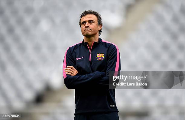 Had coach Luis Enrique looks on during a FC Barcelona training session on the eve of the UEFA Champions League semi final second leg match against FC...