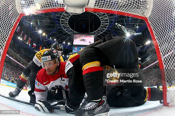 Thomas Raffl of Austria slides into the net during the IIHF World Championship group A match between Germany and Austria at o2 Arena on May 11, 2015...