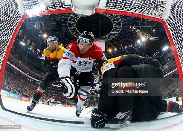Thomas Raffl of Austria fails to score over Dennis Endras,goaltender of Germany during the IIHF World Championship group A match between Germany and...