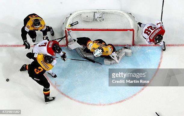 Dennis Endras, goaltender of Germany tends net against Austria during the IIHF World Championship group A match between Germany and Austria at o2...