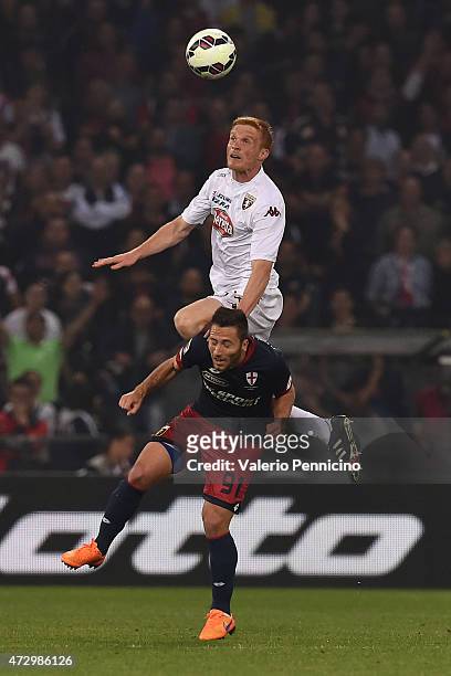 Andrea Bertolacci of Genoa CFC clashes with Alessandro Gazzi of Torino FC during the Serie A match between Genoa CFC and Torino FC at Stadio Luigi...