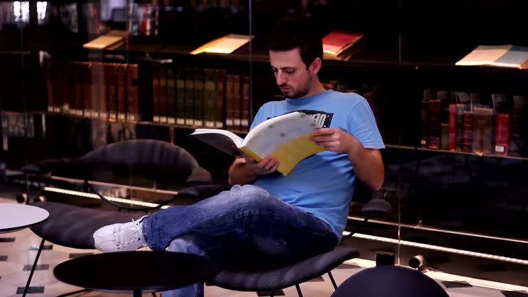 Guy In Library Man In Library Reading Book Videos and HD Footage - Getty Images