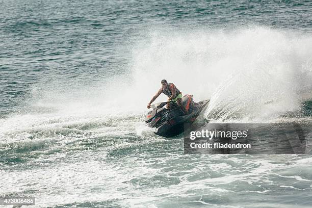 man on jetski - adventure stock pictures, royalty-free photos & images
