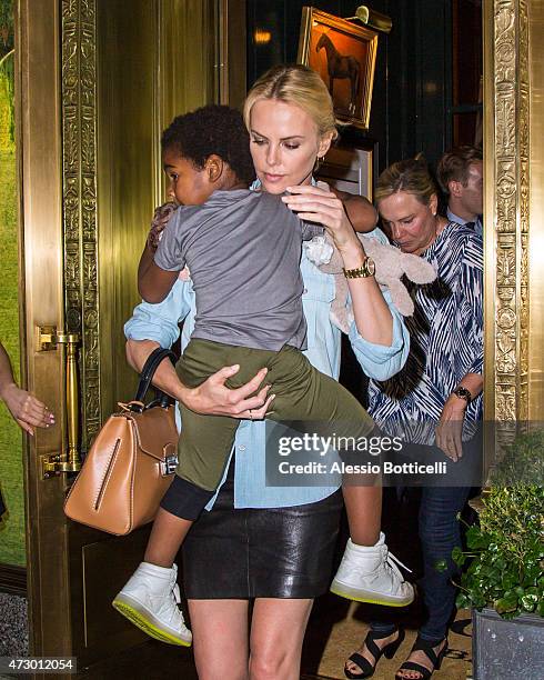 Charlize Theron and her son Jackson Theron are seen having dinner at The Polo Bar on May 11, 2015 in New York City.