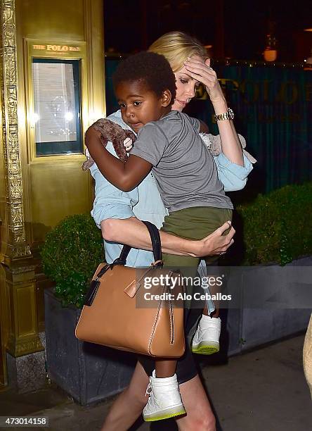 Charlize Theron and Jackson Theron are seen in Midtown on May 11, 2015 in New York City.