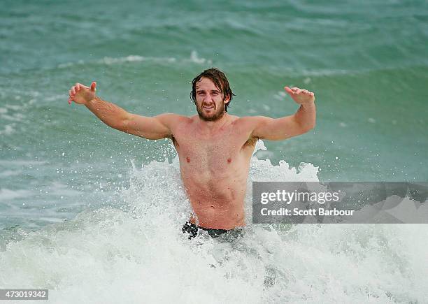 Jobe Watson, captain of the Bombers wades in the water during an Essendon Bombers AFL recovery session at St Kilda Sea Baths on May 12, 2015 in...